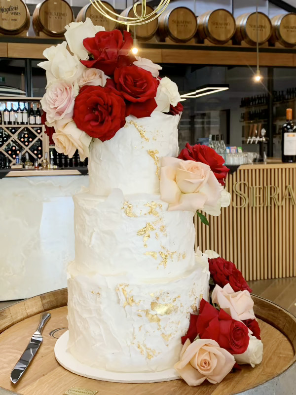 white with wafer paper, gold foil and roses